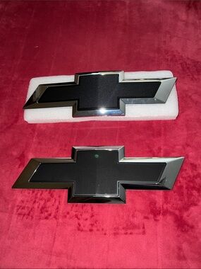 Brand New Front & Rear Silverado 1500 Black/Chrome Emblem Badge Set.